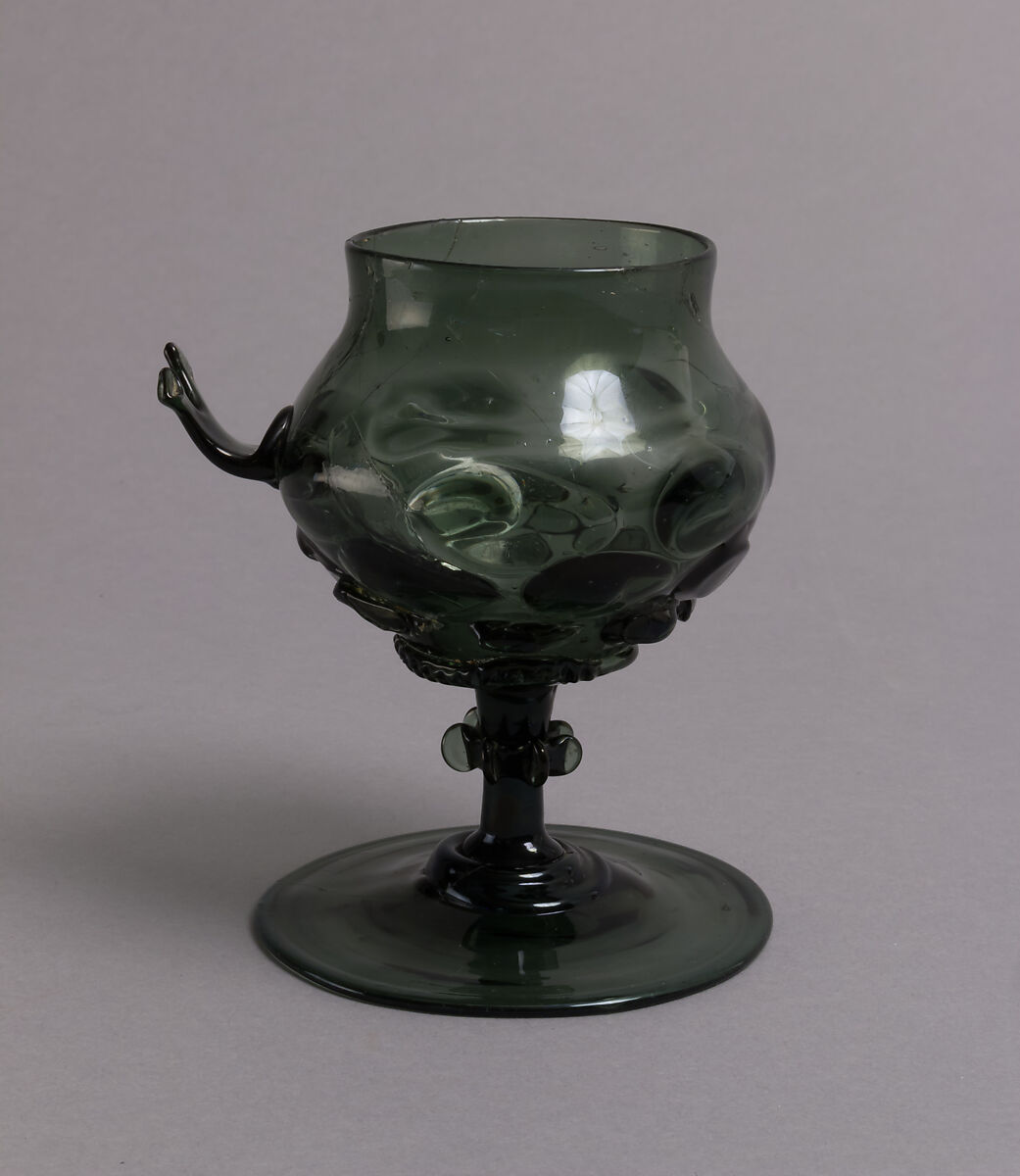 Footed Cup with handle: Scheuer, Free-blown glass with applied decoration, German