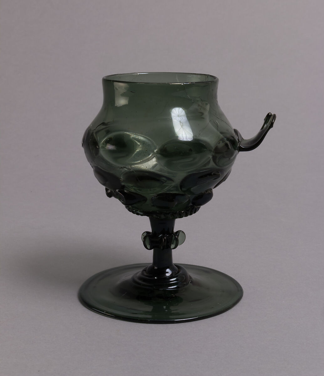 Footed Cup with handle: Scheuer, Free-blown glass with applied decoration, German