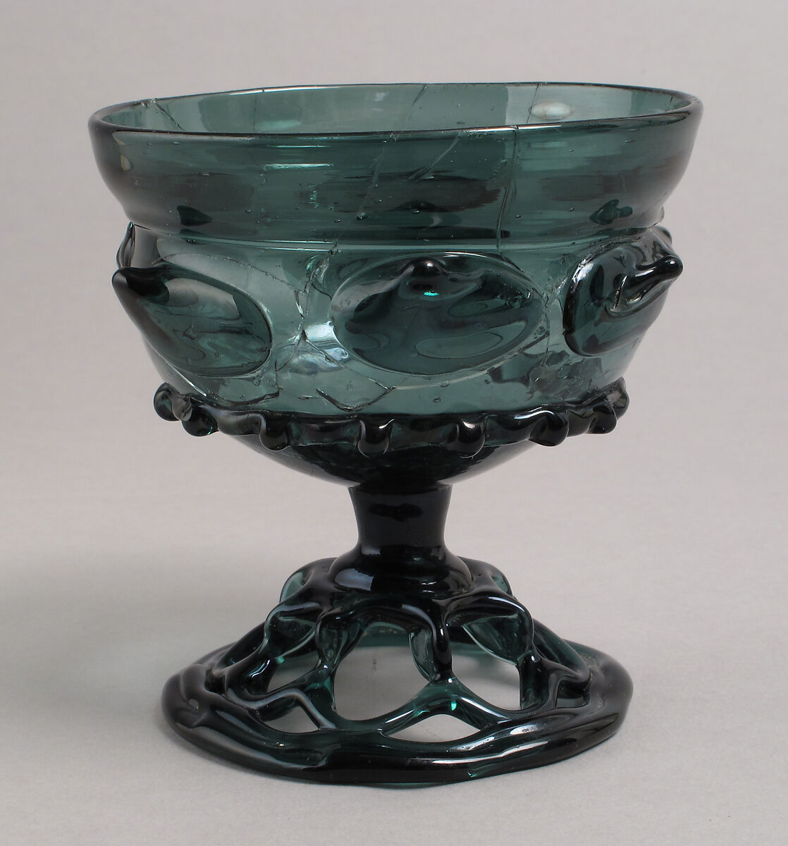 Beaker with open-work foot, Free-blown glass with applied decoration, German
