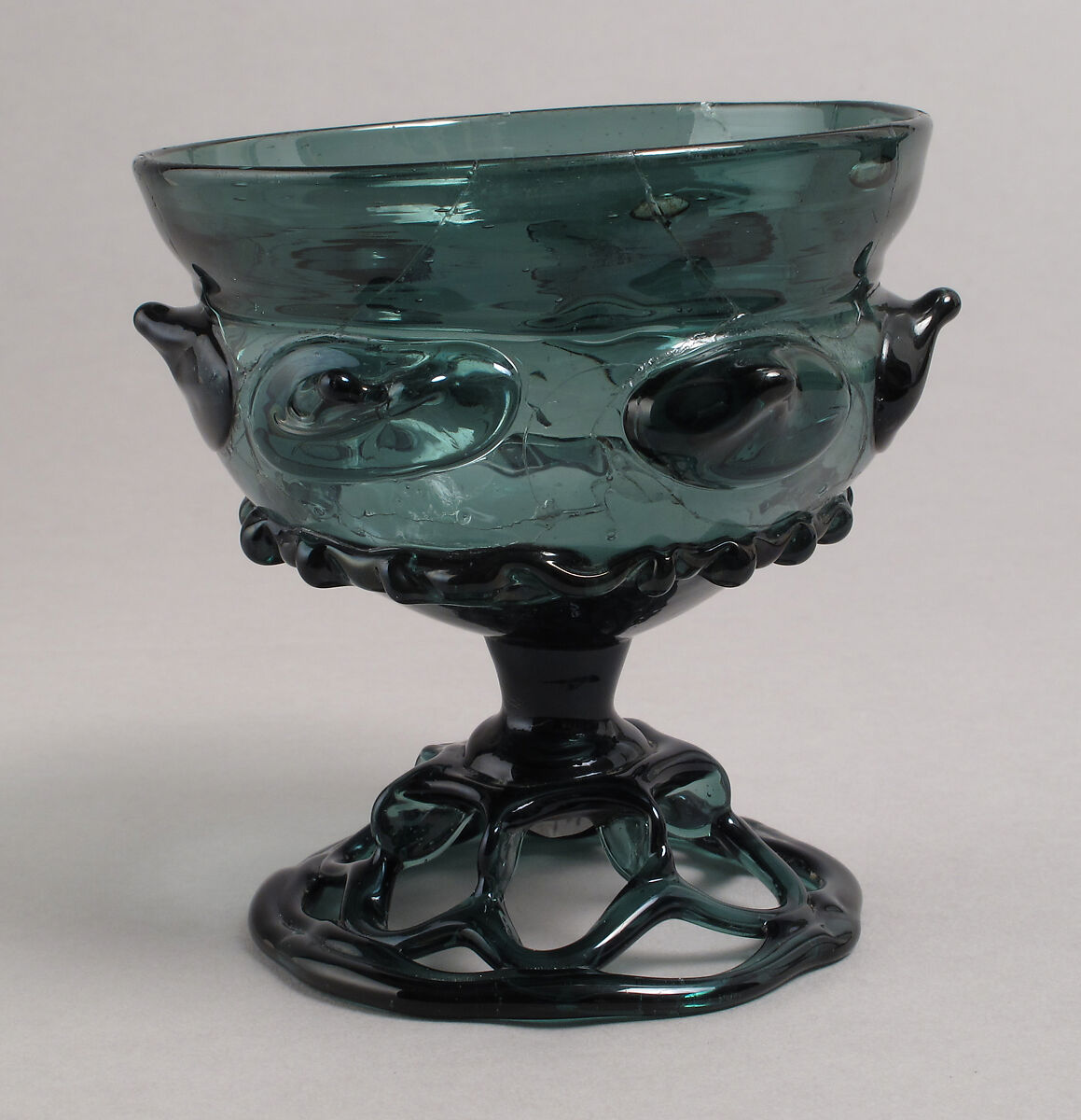 Beaker with open-work foot, Free-blown glass with applied decoration, German