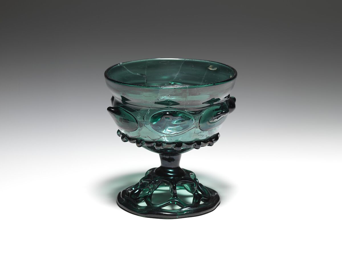 Beaker with open-work foot, Free-blown glass with applied decoration, German 