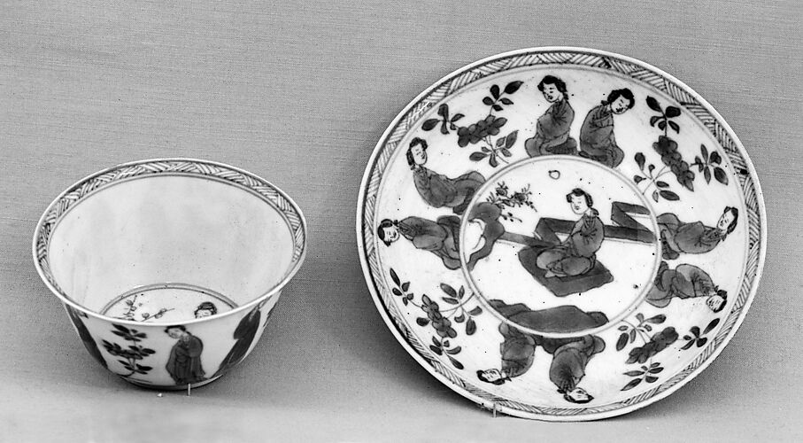 Cup and saucer with ladies