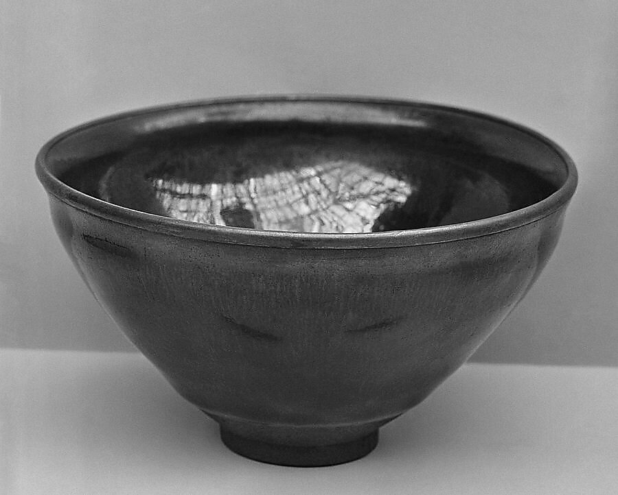 Bowl, Dark brown clay with heavy black glaze and metal rim (Jian ware), China 
