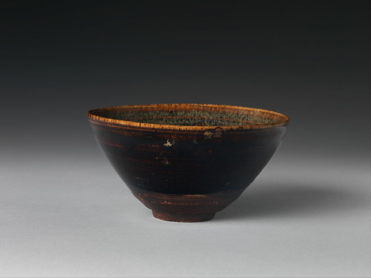 Tea bowl with decoration of six-petaled flowers, Stoneware with black and brown glazes and paper-cut designs (Jizhou ware), China