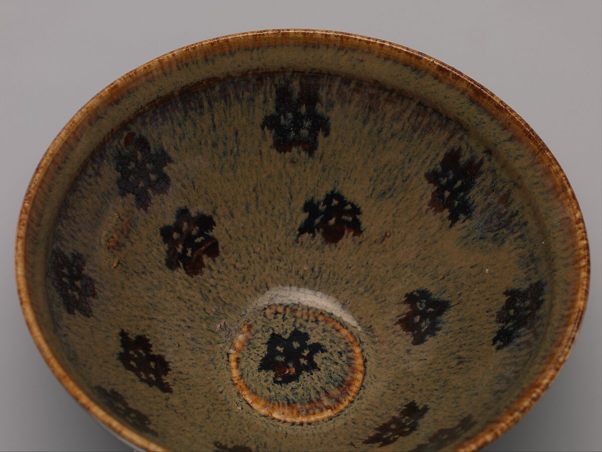 Tea bowl with decoration of six-petaled flowers, Stoneware with black and brown glazes and paper-cut designs (Jizhou ware), China