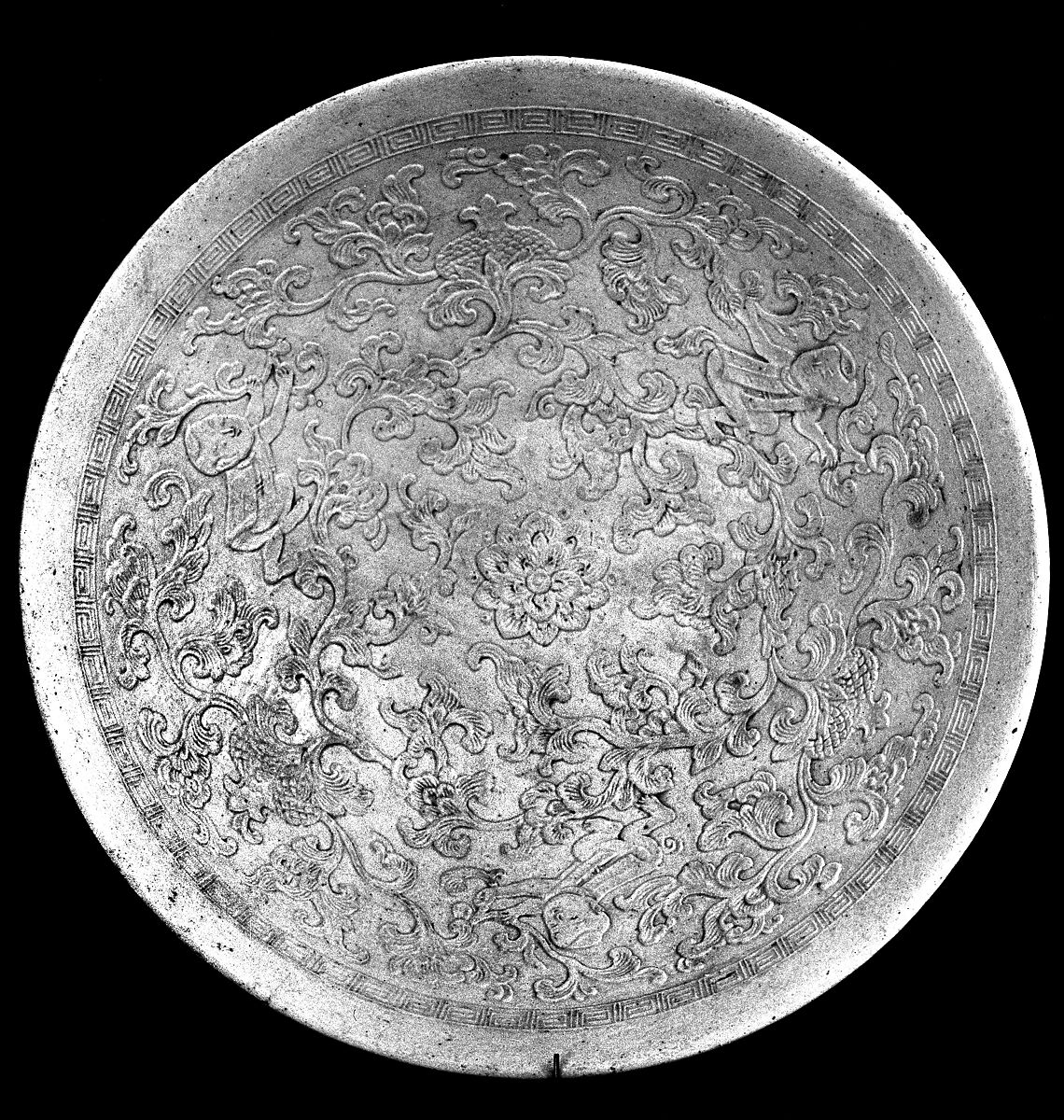 Bowl with boys amid floral sprays, Porcleain with impressed-mold decoration (Jingdezhen ware), China 