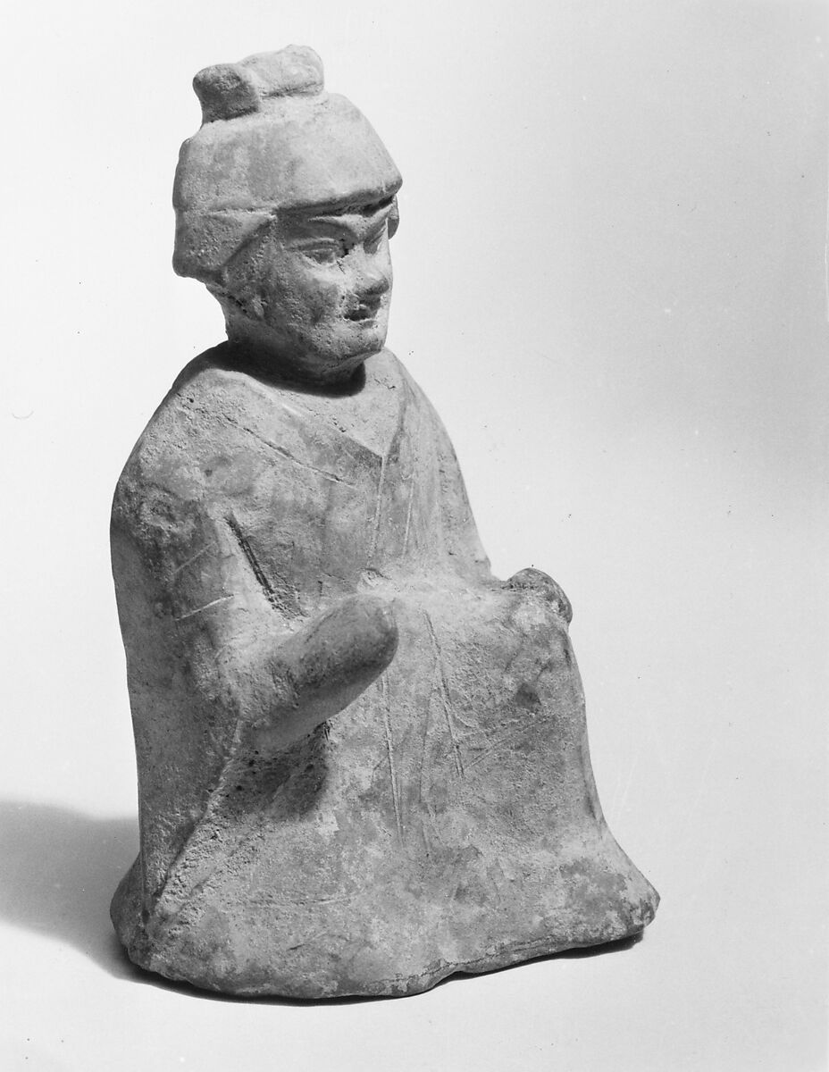 Figure of a seated man, Earthenware with pigments, China
