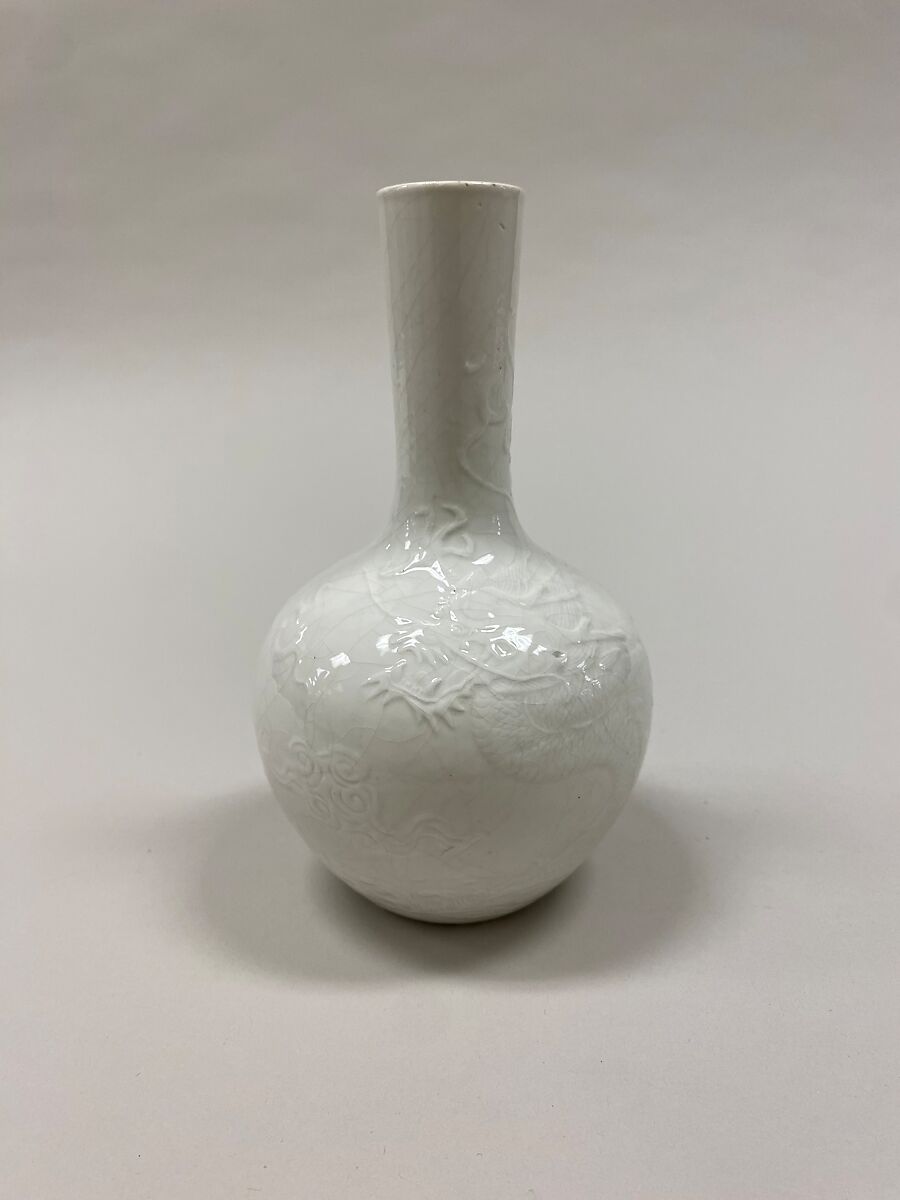 Bottle vase with dragon, Porcelain with relief decoration (Jingdezhen ware), China 