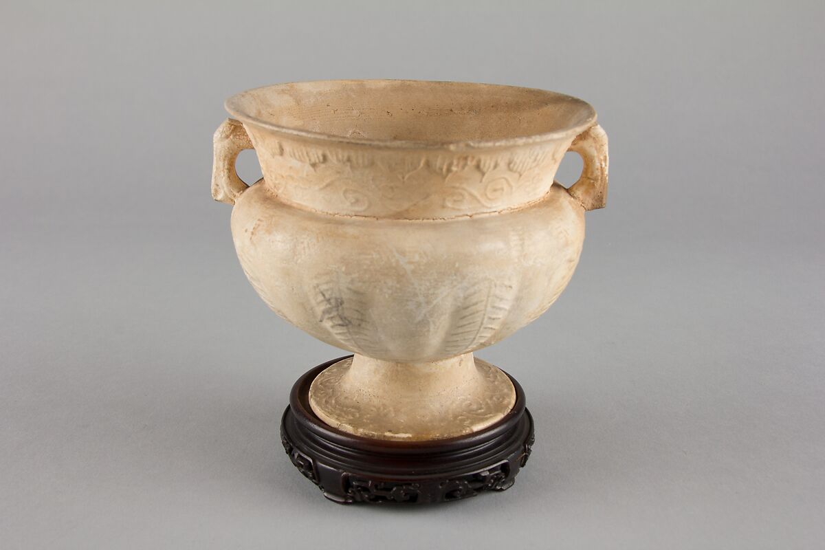 Stem cup, Earthenware with molded decoration under clear glaze, China