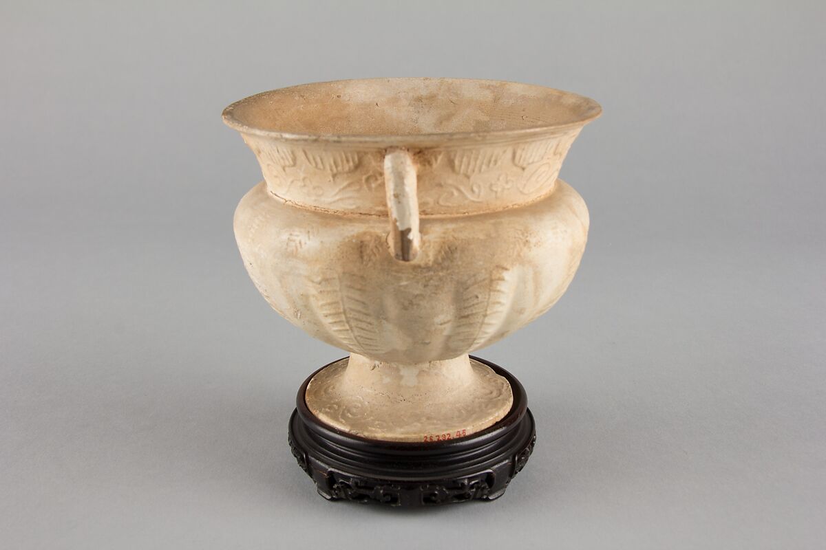 Stem cup, Earthenware with molded decoration under clear glaze, China