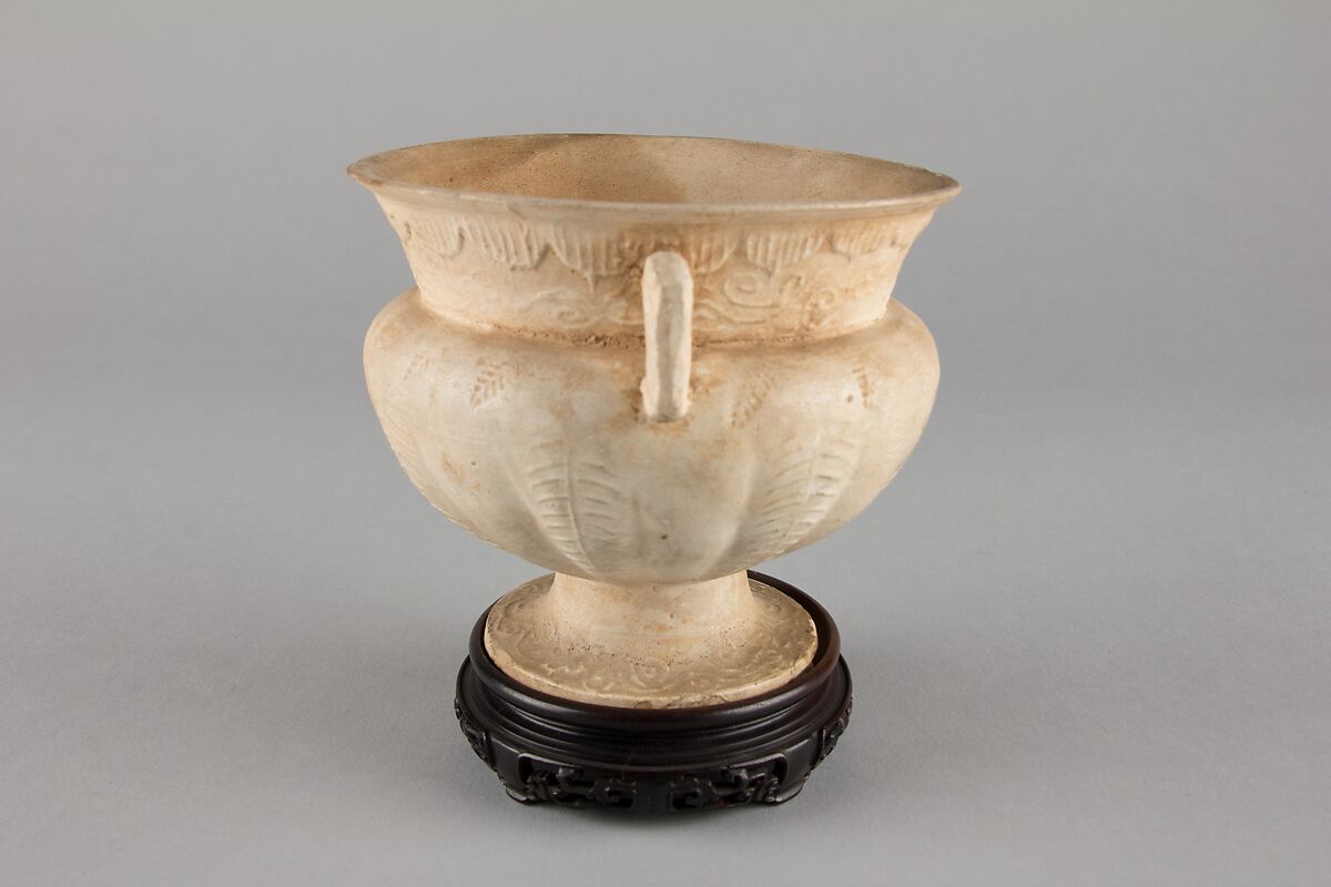Stem cup, Earthenware with molded decoration under clear glaze, China
