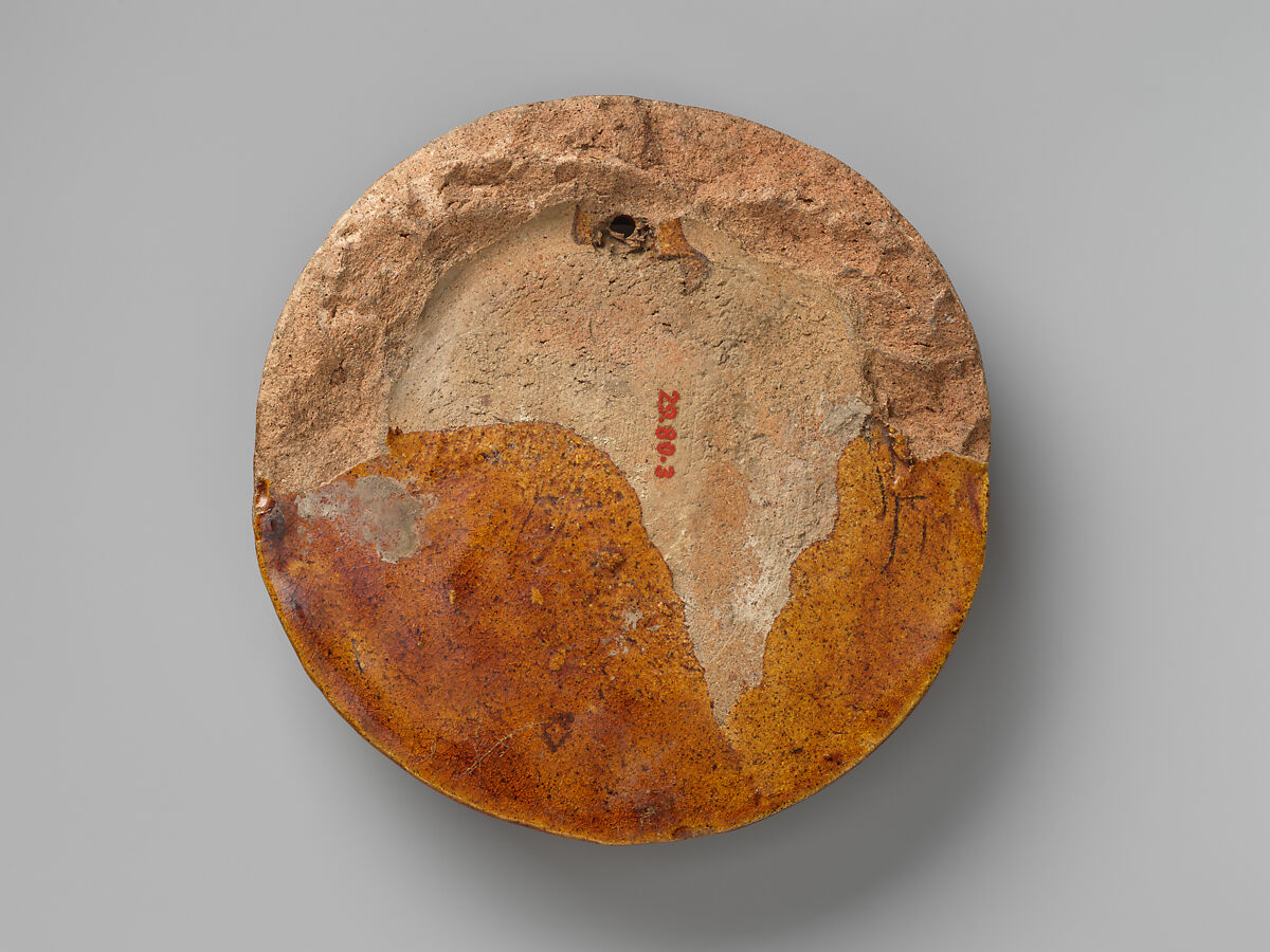 Roof tile end with dragon, Earthenware with yellow glaze, China