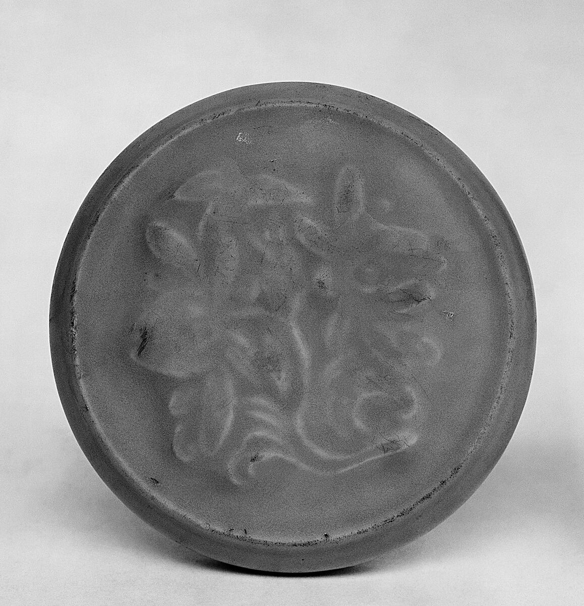 Lid of a box, Stoneware with mold decoration under a celadon glaze (Longquan ware), China