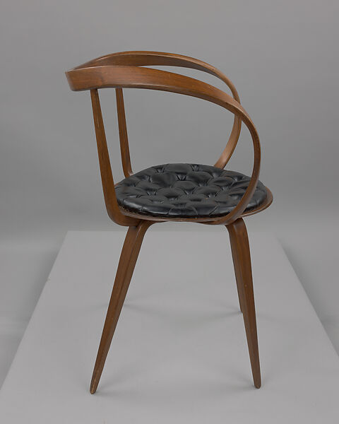 "Pretzel" Armchair, George Nelson (American, 1908–1986), Laminated birch plywood, walnut veneer