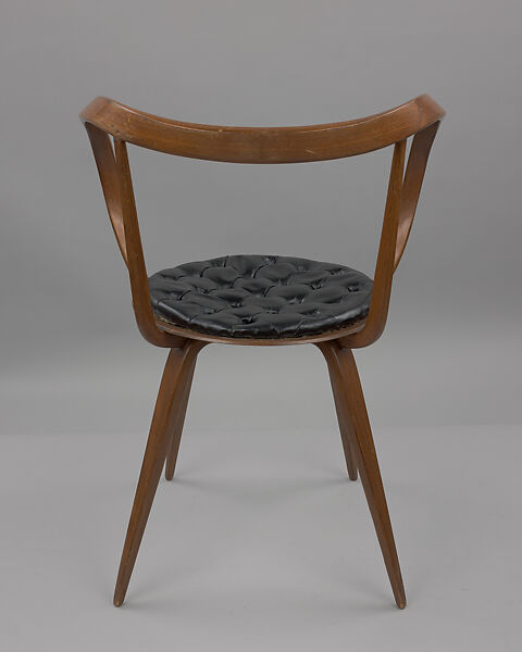 "Pretzel" Armchair, George Nelson (American, 1908–1986), Laminated birch plywood, walnut veneer