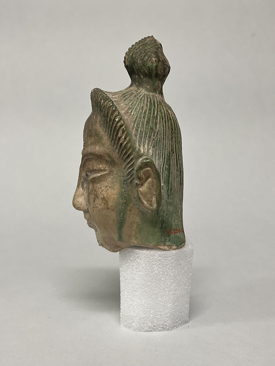Head of a Bodhisattva, Earthenware with green glaze, China