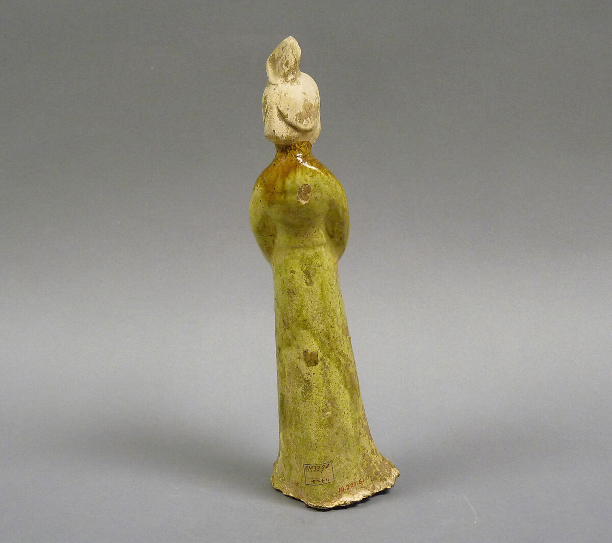 Figure of a standing woman, Eartheware with polychrome glaze (Sancai ware), China