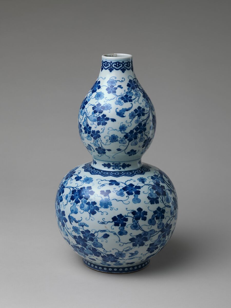 Gourd-shaped vase with gourds on vines and bats, Porcelain painted in underglaze cobalt blue (Jingdezhen ware), China