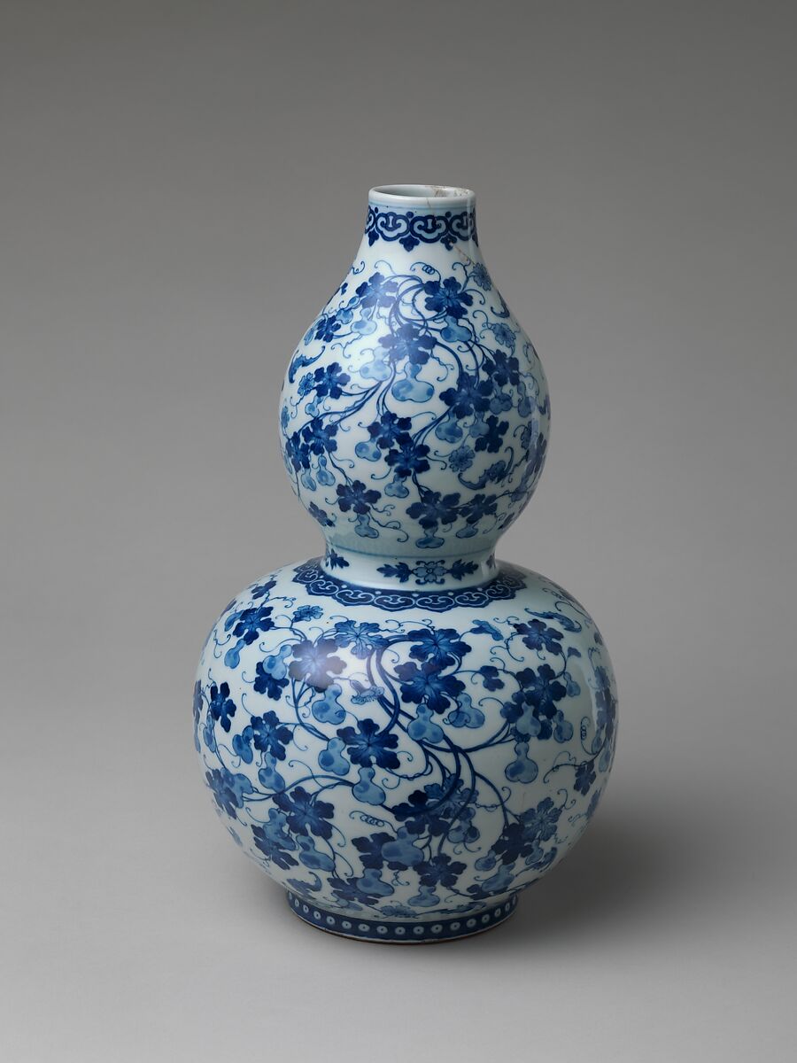 Gourd-shaped vase with gourds on vines and bats, Porcelain painted in underglaze cobalt blue (Jingdezhen ware), China