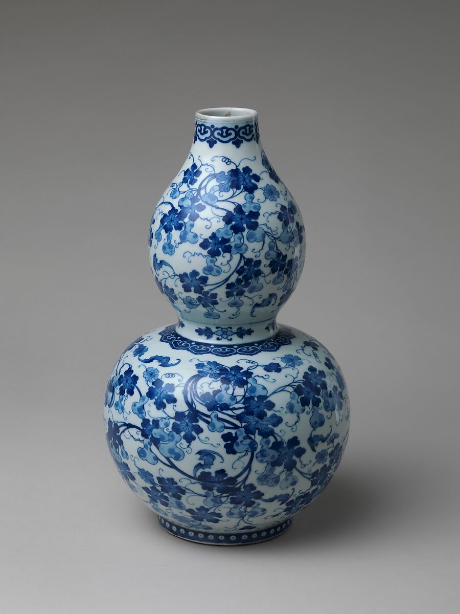 Gourd-shaped vase with gourds on vines and bats, Porcelain painted in underglaze cobalt blue (Jingdezhen ware), China 