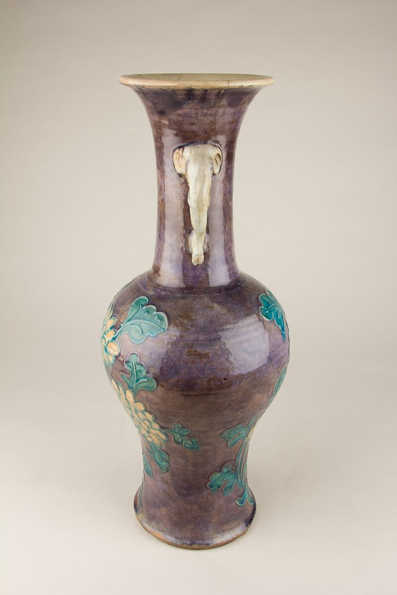 Vase with elephant head handles and floral decoration, Stoneware with relief decoration and polychrome glaze, China