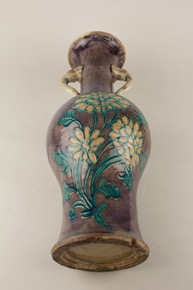 Vase with elephant head handles and floral decoration, Stoneware with relief decoration and polychrome glaze, China