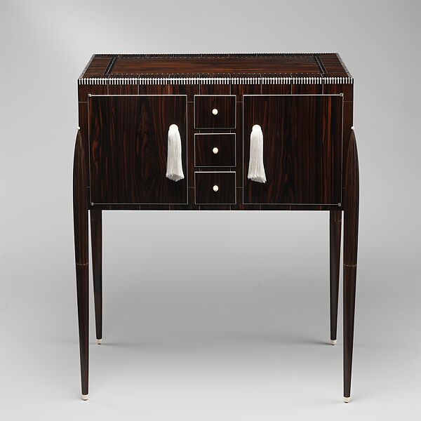 "Fuseaux" Cabinet, Emile-Jacques Ruhlmann (French, Paris 1879–1933 Paris), Macassar ebony, ivory, silk, silvered bronze