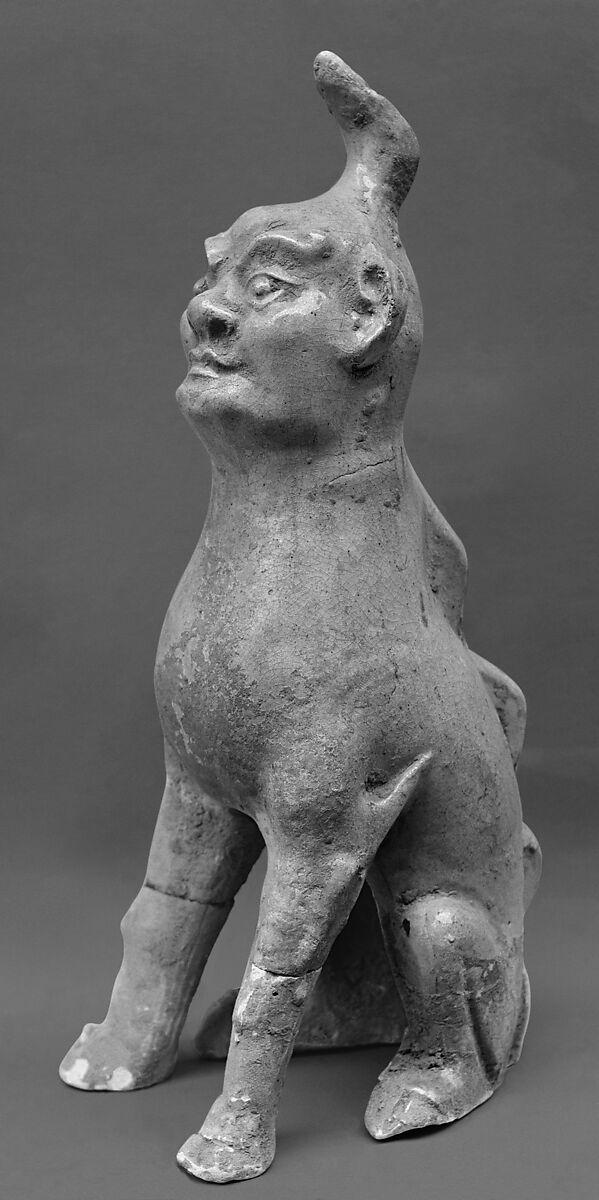 Tomb guardian beasts with dog, Earthenware with pale green glaze, China