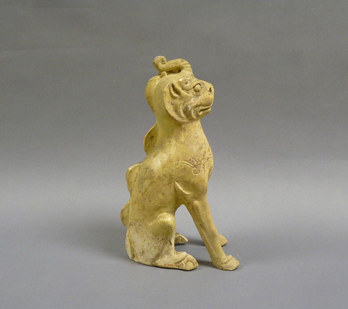 Tomb guardian beasts with dog, Earthenware with pale green glaze, China