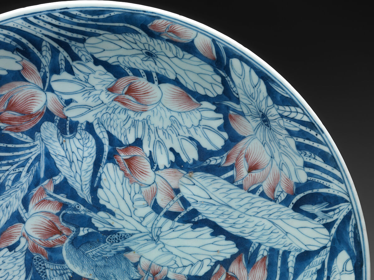 Plate with egrets in a lotus pond, Porcelain painted in underglaze cobalt blue and copper red (Jingdezhen ware), China