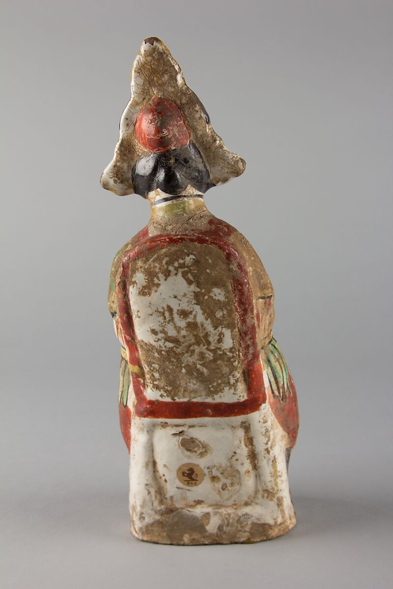 Figure of a sitting woman, Stoneware painted in overglaze polychrome enamels, China