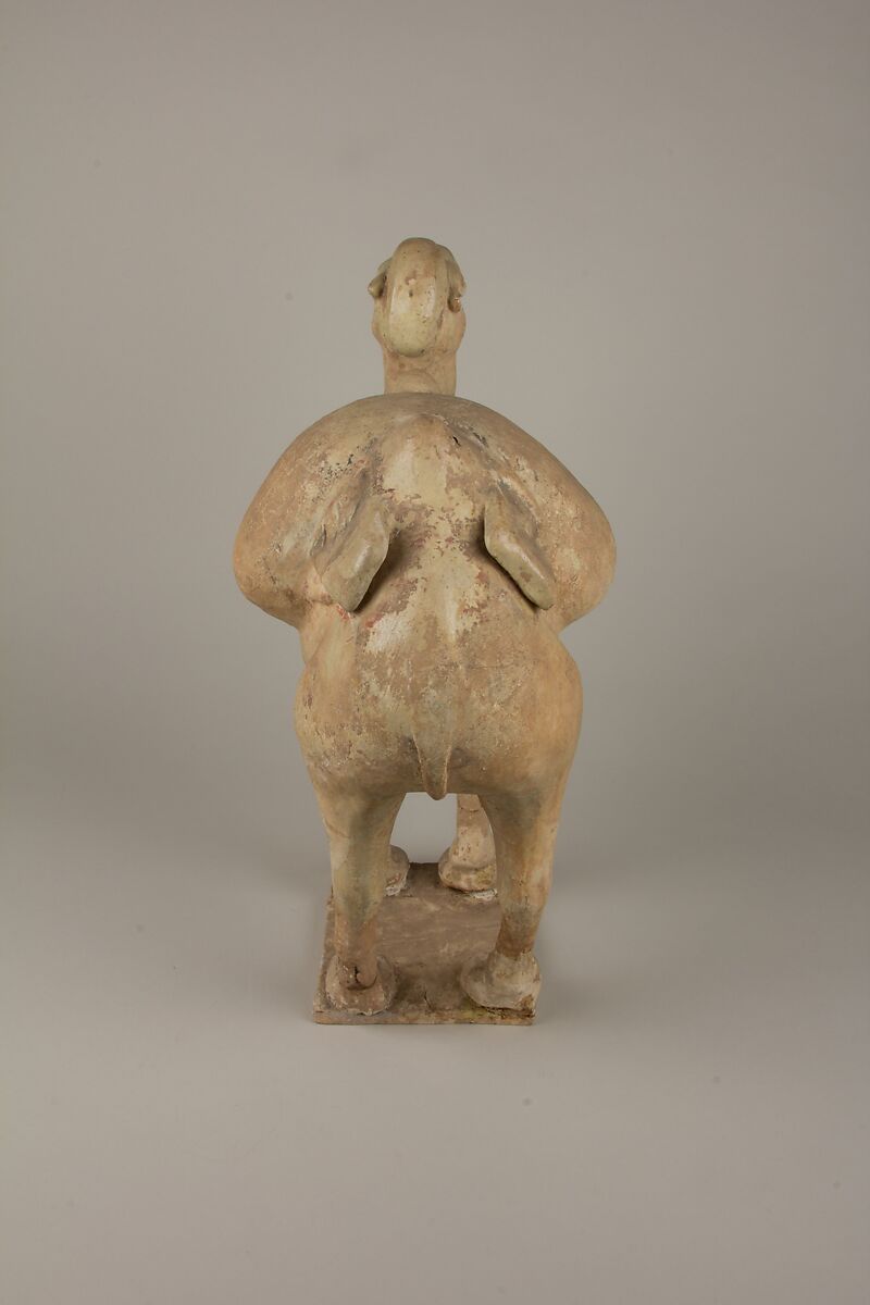 Two camels, a: Earthenware; b: Earthenware with traces of pigment, China