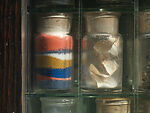 Untitled (Pharmacy), Joseph Cornell (American, Nyack, New York 1903–1972 Flushing, New York), Box construction: wood, glass, mirror, shells, sand, printed paper, coral, cork, feather, metal, and liquid