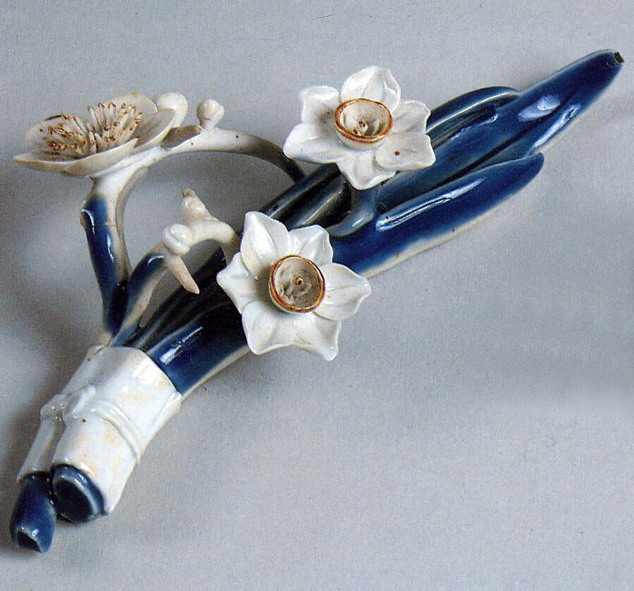 Brush Rest (Fude-oki) in the Shape of a Narcissus Spray and Blossoming Plum Branch, Molded porcelain with cobalt blue under transparent glaze (Mikawachi ware), Japan 