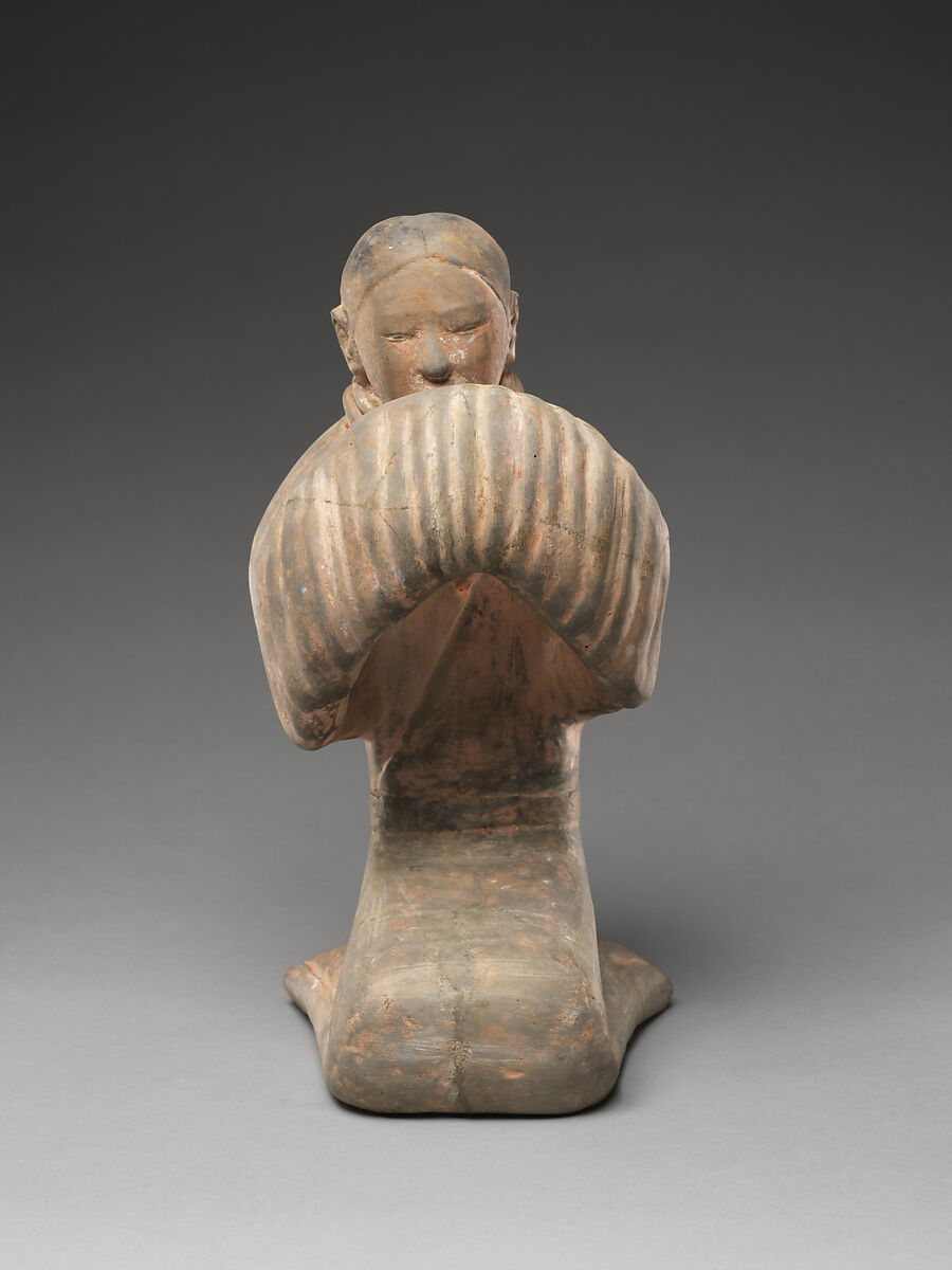 Kneeling Lady in Greeting Gesture, Earthenware with traces of pigments over white slip, China 