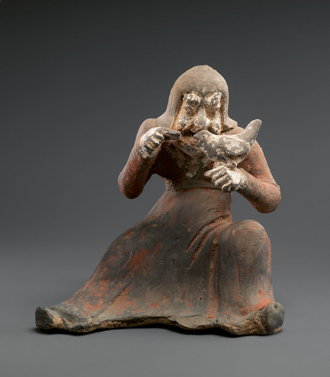 Seated Falconer, Earthenware with red and white pigments, China 