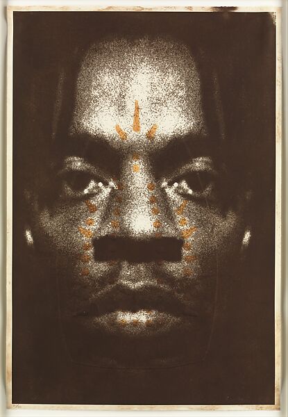 Man Spirit Mask, Willie Cole (American, born Newark, New Jersey, 1955), Left panel: Photo-etching, embossing and hand coloring
Middle panel: silkscreen with lemon juice and scorching
Right panel: photo etching and woodcut