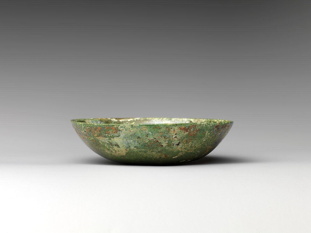 Bowl with double fish, dancers, and animals, Bronze, China (Xinjiang Autonomous Region, Central Asia)