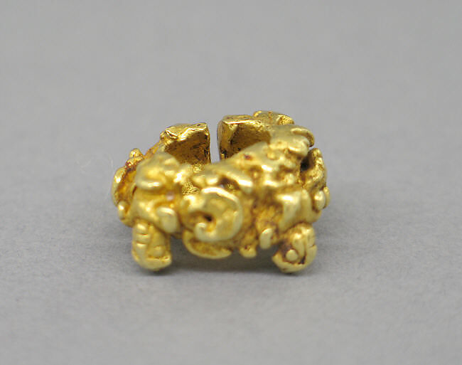 Ear Clip with Four Figures on a Foliate Ground, Gold, Indonesia (Java) 