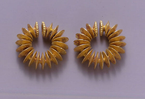 Pair of Ear Clips Composed of Fused Discs