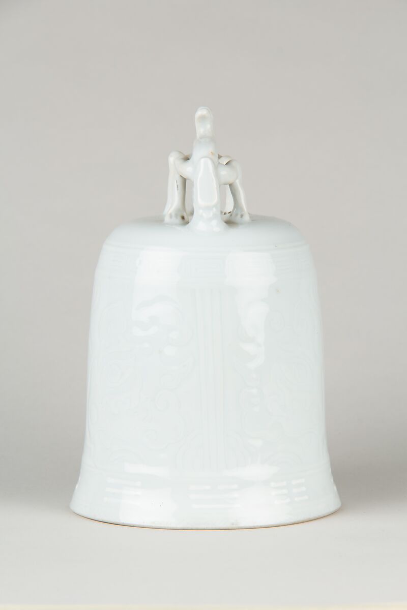 Bell, Porcelain with low-relief decoration under clear glaze.  Dehua ware (blanc de chine), China