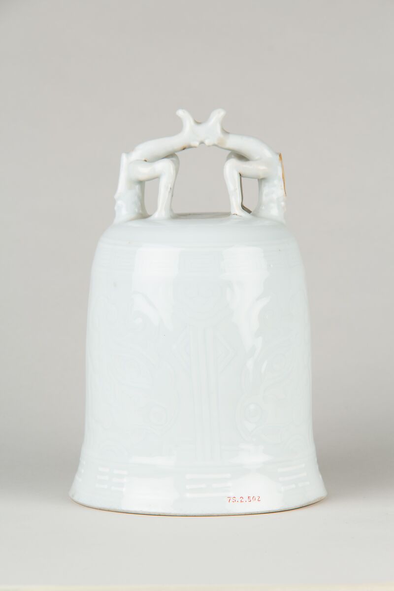 Bell, Porcelain with low-relief decoration under clear glaze.  Dehua ware (blanc de chine), China