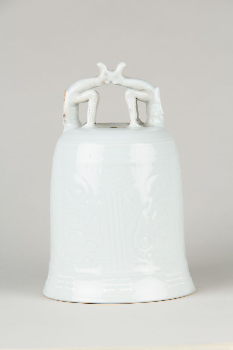 Bell, Porcelain with low-relief decoration under clear glaze.  Dehua ware (blanc de chine), China 