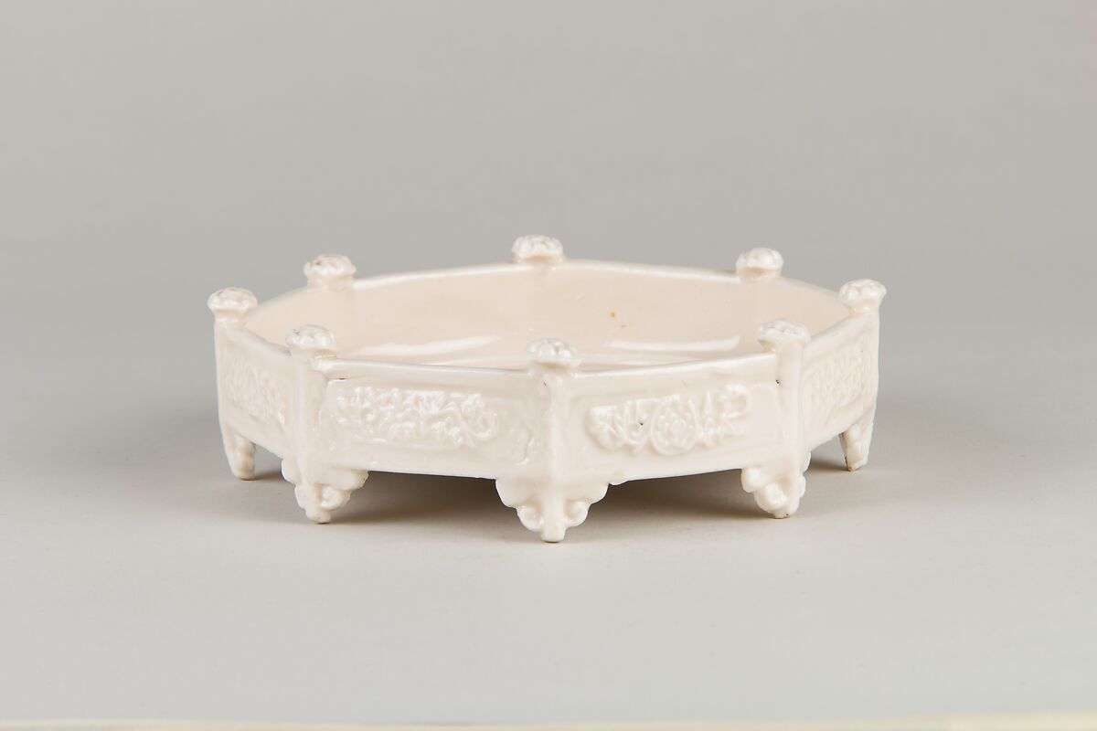 Stand, Porcelain with low-relief decoration under opaque yellow glaze, China