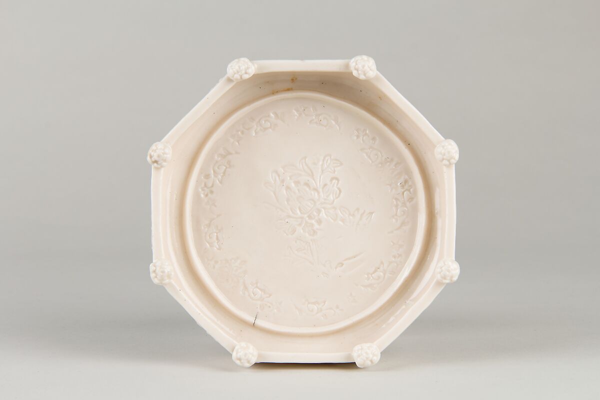 Stand, Porcelain with low-relief decoration under opaque yellow glaze, China