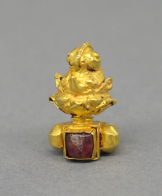 Pair of Ear Clips with Translucent Red Stone, Gold with translucent red stone, Indonesia (Java)