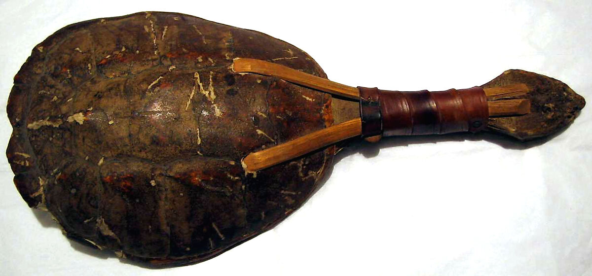Kanyáhte’ ká’nowa’ (Snapping turtle rattle) or Kastáwēˀshæˀ  (Ga-Nó-Wa Gustáh), Shell, wood, cherry pits?, leather, Native American (Iroquois)
