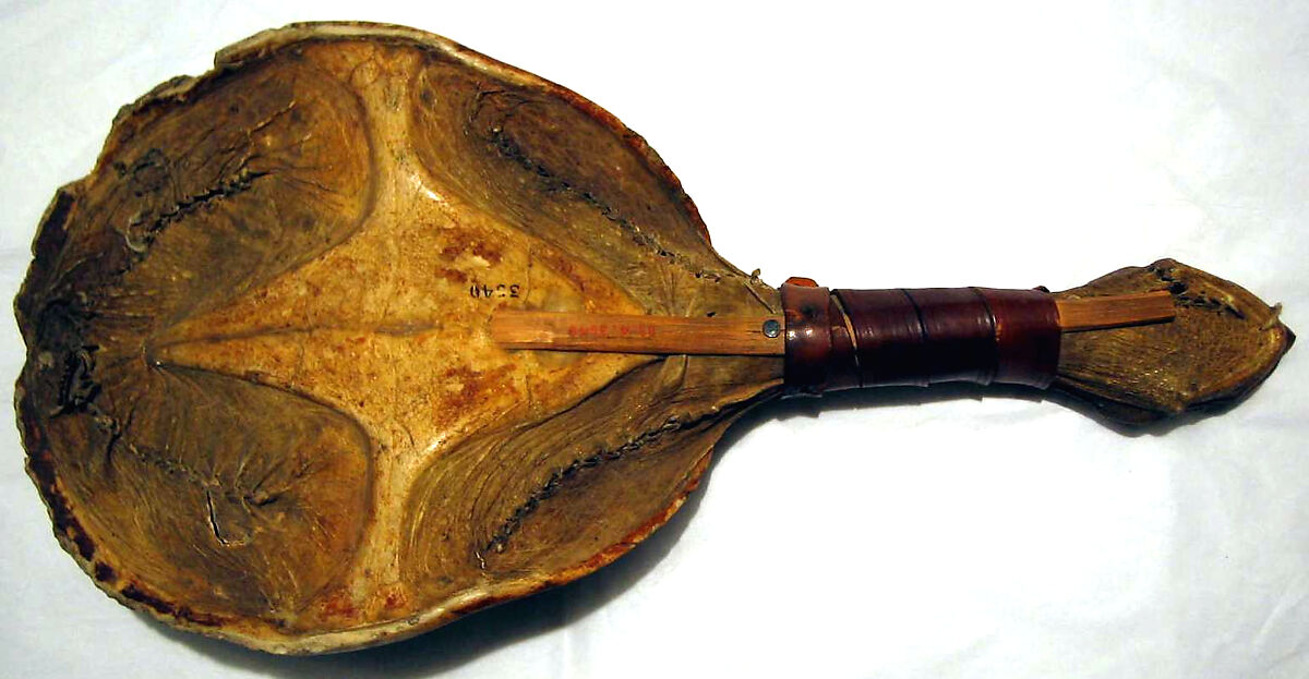 Kanyáhte’ ká’nowa’ (Snapping turtle rattle) or Kastáwēˀshæˀ  (Ga-Nó-Wa Gustáh), Shell, wood, cherry pits?, leather, Native American (Iroquois)