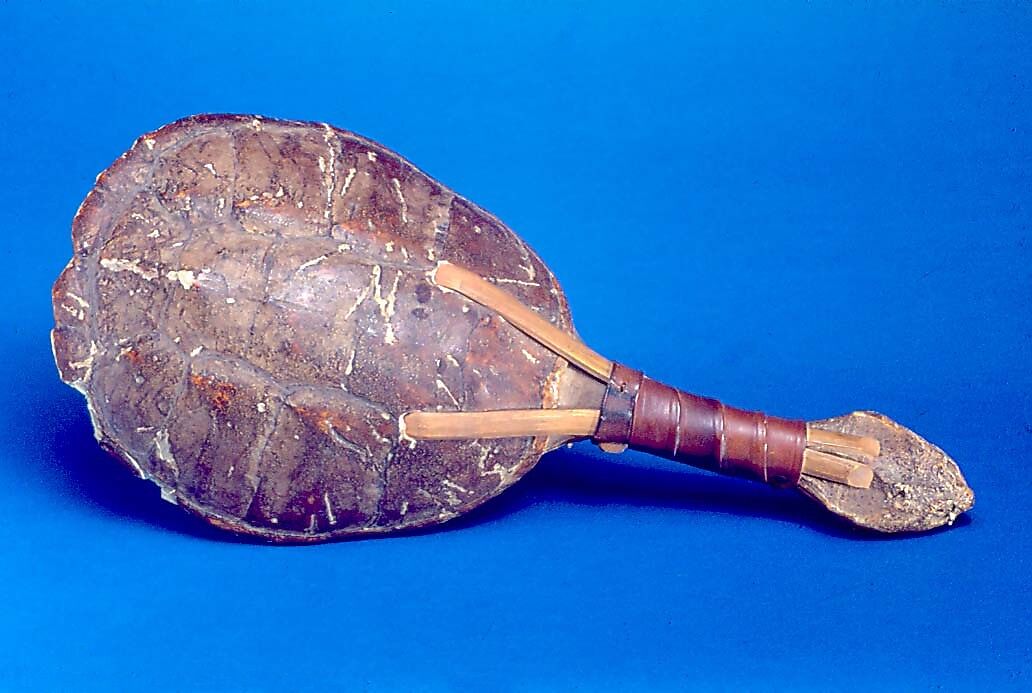 Kanyáhte’ ká’nowa’ (Snapping turtle rattle) or Kastáwēˀshæˀ  (Ga-Nó-Wa Gustáh), Shell, wood, cherry pits?, leather, Native American (Iroquois)