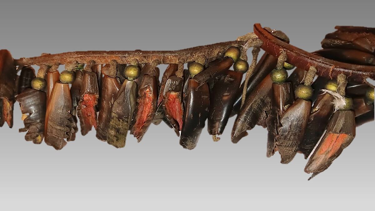 Dew Claw Strung Rattle, Dewclaws, leather, rawhide, brass, eagle's claw and feathers, deer's tail, Native American (Osage, Wazhazhe)